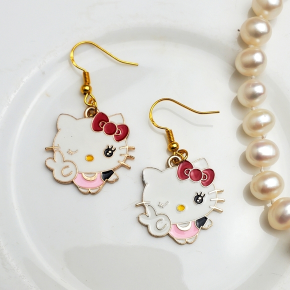 🌟5/$25 Hello Kitty peace sign earrings - Picture 3 of 3
